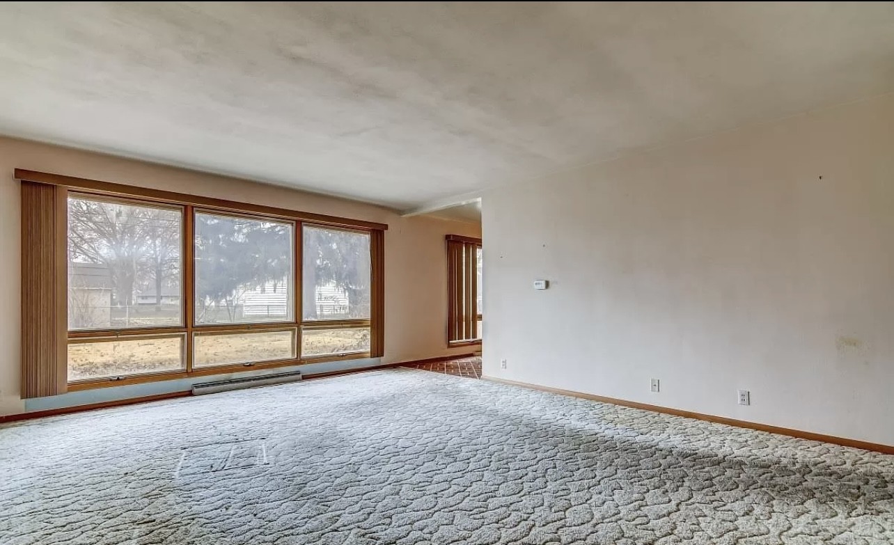 Blackhawk living room before wall opening