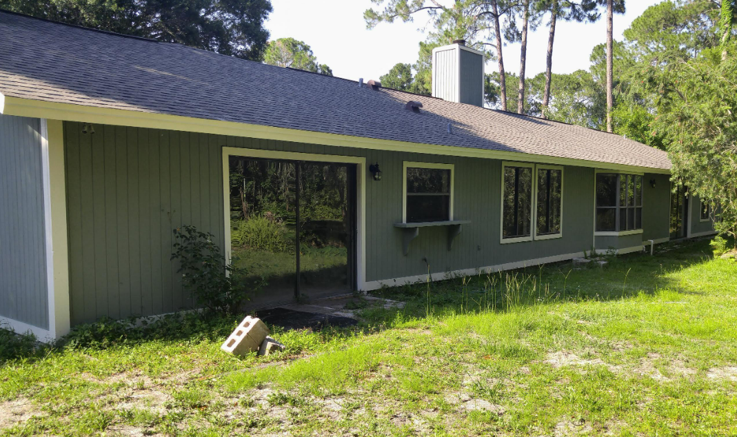 Pine Needles rear exterior before