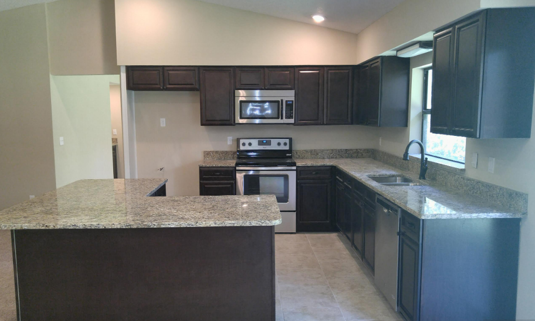 Pine Needles kitchen cabinets before