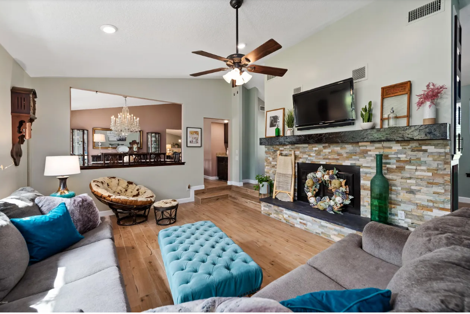Pine Needles living room fireplace after